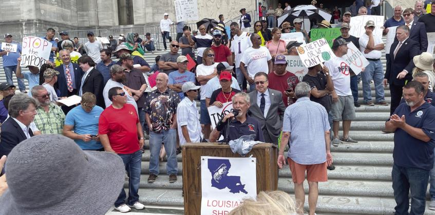 Louisiana Shrimp Association leader Acy Cooper talks on need for unity at Shrimpers Rally. Photo by Justin Walton