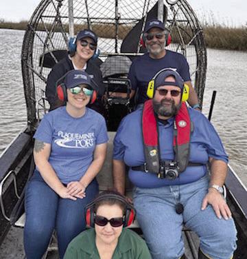Fort St. Philip is only accessible by boat or helicopter. Pictured in the back row, from left: Christie Nielsen (Port Director of Administration) and Charles Tillotson (Port Executive Director of the Port). Midde row: Danielle Rollo (Port HR Supervisor) and Toppy Cacioppo (Ferry Manager). And in the front is Brenda Lally (Accounting Clerk).
