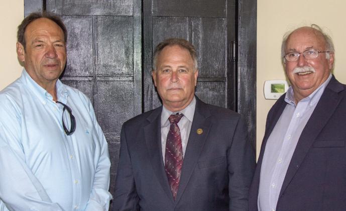Nearly 100 members of the Plaquemines Association of Business and Industry (PABI) were very encouraged by the positive outlook for Plaquemines Parish offered by Parish President Keith Hinkley. From left are PABI Chair Mike Roy, Hinkley and PABI Executive Director Bobby Thomas. Photo by Zu Carpenter
