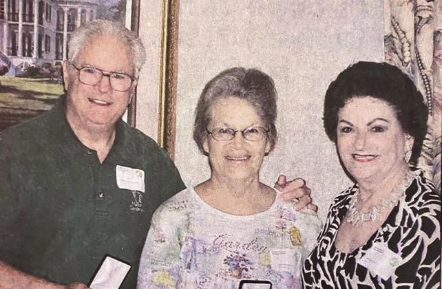 Norman and Glenda receiving Silver Medallion Awards for their dedication to horticulture from Louisiana Society for Horticultural Research President Margo Racca.
