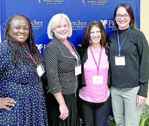 Pictured from left to right are Nzinga Hill, Supervising Attorney O.P.D. Orleans, Ellen Doskey, retired A.D.A. Terrebonne, Caitlin Glass, Legal Representation Coordinator Pelican Center for Children and Families, and Mary Touzet, A.D.A. Plaquemines.