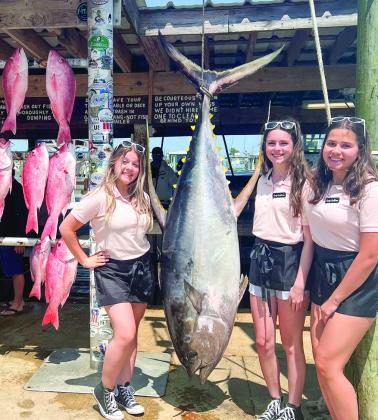 Pictured are Camp SoulGrow members with a 216 lb. yellowfin tuna and American red snappers that were caught by Captain Richard Draper of the Mexican Gulf Fishing Company at the Venice Marina Snapper Slam.
