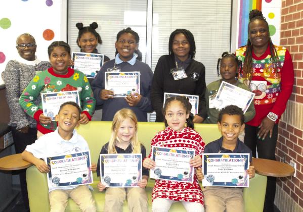 Congratulations to all South Plaquemines Elementary School students who were recognized as December Students of the Month. These students worked hard and exhibited positive behavior expectations. We are proud of them. Keep up the good work. Pictured in front row, from left: Derrin Williamson, Madelynn Bochner, Emery Tyler and Isah Williams. Back row: Mrs. Tonya Redmond, Brielle Barthelemy, Shawnae Jackson, Kylen Reddick, Joelle Ancar, KyLeigh Williams and Dr. Stacey-Ann Barrett.