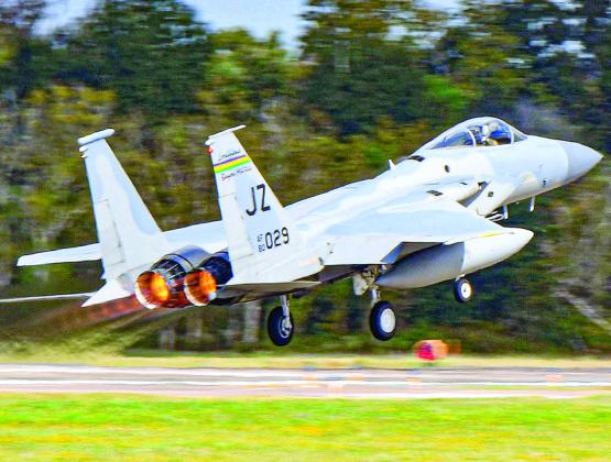 An F-15C Eagle takes off from NAS-JRB New Orleans, on Nov. 6. The exercise included 13 Boeing F-15Cs launching to participate in a training exercise with 7 other aircraft over the Gulf of Mexico. US Air National Guard photo by Senior Master Sgt. Daniel Farrell