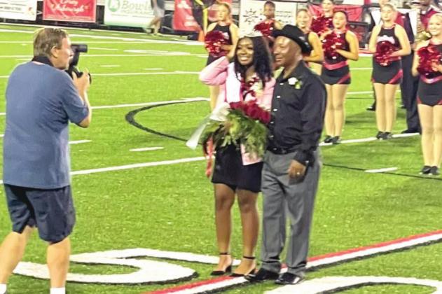 Pictured is Dallas Delani with her father Drexel Narcisse just moments after she was crowned as Homecoming Queen for the 2021 school year at Belle Chasse High School.