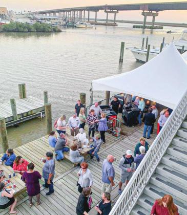 The 100-year celebration featured a mass at the church and a further celebration at the Delta Marina located on the historic Doullut Canal.