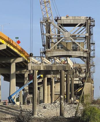 Bridges come down much faster than they go up. Over the past month, demolition of the Belle Chasse Bridge has seen the removal of the bridge deck, the counterweights, motors, and cables that operated the 60-year-old lift bridge. The concrete approach on the south side is nearly gone as well.