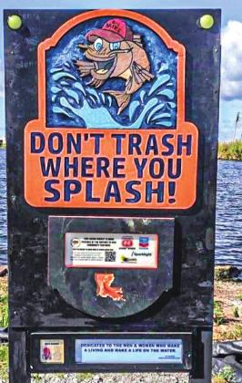 Two of the signs located at Myrtle Grove Marina in Plaquemines Parish.