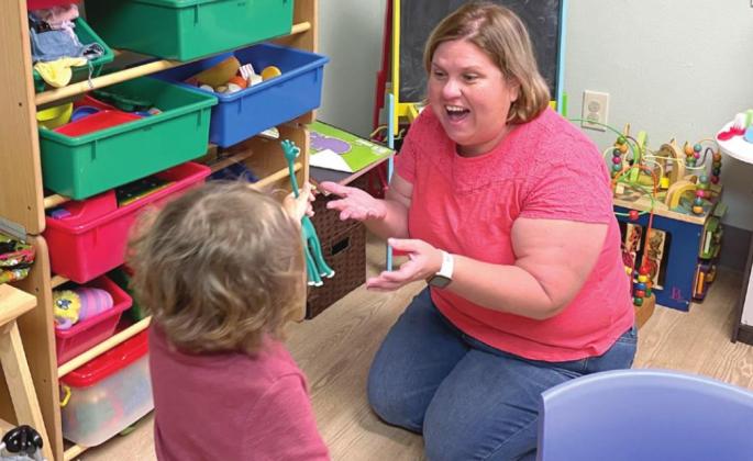 A CARE Center Clinician conducts a play therapy session with a pre-school age client.
