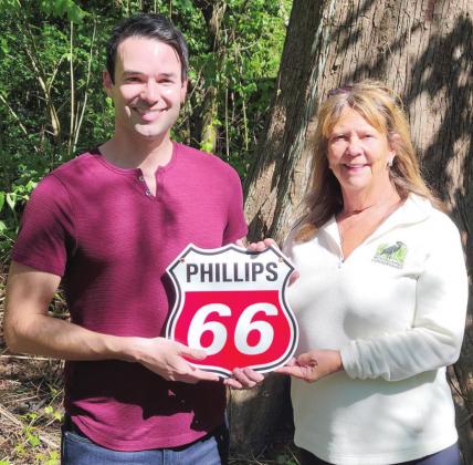 Pictured, from left: Tristan Babin, Phillips 66 Public Affairs Advisor, with Katie Brasted, Woodlands Conservancy Executive Director.