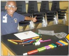Belle Chasse Acdemy’s Math Play ASA allows students to practice their seven habits. Second grader Aiden Mack Begins with the End in Mind, while discovering the uses of Cuisenaire Rods.