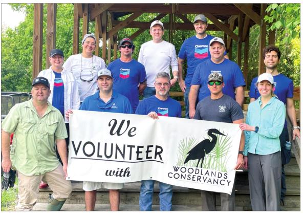 Pictured are the Chevron Oronite volunteers at Woodlands Preserve in Belle Chasse on May 19.