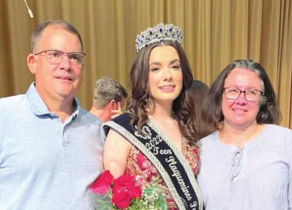 2022 Teen Seafood Queen Amy Hochhalter with her parents, David and Becky.