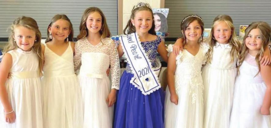 Pictured are the 2022 Seafood Pearl contestants with the 2021 Seafood Pearl, Ava Rodi. Pictured from left: Lainey Taylor (daughter of Bret and Janice Taylor of Jesuit Bend), Emersyn Begovich (daughter of Bud and Aegina Begovich of Belle Chasse), Carley Rayne Morse (daughter of Scott and Kristie Morse of Jesuit Bend), 2021 Seafood Pearl Ava Rodi, Ellie Rodi (daughter of Jake and Rachel Rodi of Belle Chasse), Audriana Zupanovic (daughter of Anthony and Lindsey Zupanovic of Belle Chasse), and Ivy Grace Brooks.