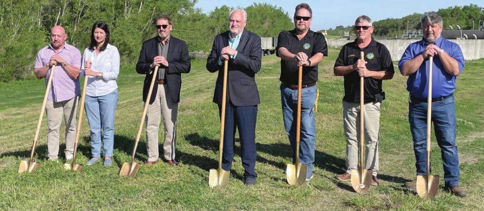 Pictured, from left: Carl Panebiango of Hard Rock Construction poses with district 6 council member Trudy Newberry, district 5 council member Benny Rousselle, parish president Kirk Lepine, coastal director John Helmers, director of operations Scott Rousselle, and public service director Todd Eppley after breaking ground on the Jesuit Bend Levee Lift project.