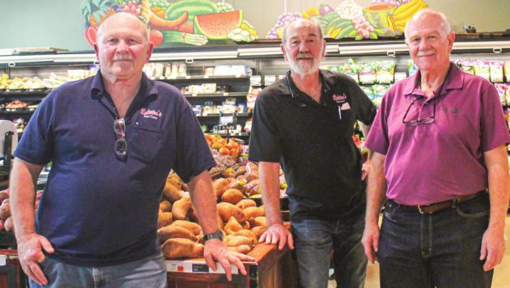 Brothers Sal, Ralph and Joe Balestra in produce department at store. The brothers have been managing the store non -stop for recent years until the sale of the family’s business last week. Photo by Brandi Rollo