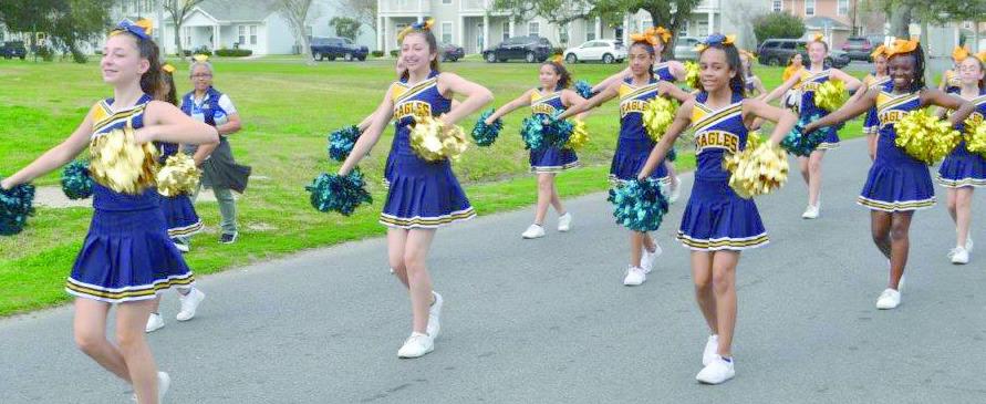 BCA Cheerleaders in the Plaquedilla Parade.