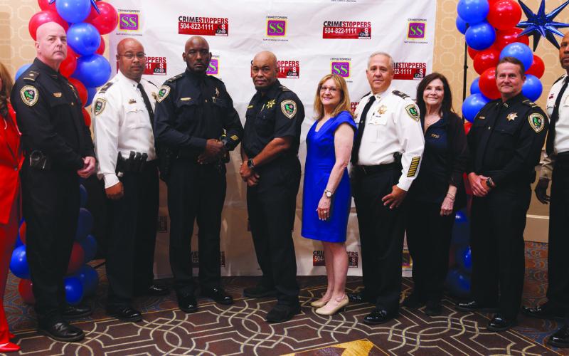 From left: Darlene Cusanza (President of Crimestoppers of New Orleans), Major Michael Martin, Captain Javon Ancar, Sgt. Craig Hudson, Sgt. Melvin Hudson, Lisa Romano (Oscar Tolmas Charitable Trust), Captain Eric Becnel, Rachele Popich, Sgt. Jack Owens, Major Byron Williams.