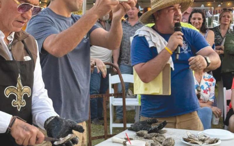 Luke Bilich wins the inaugural Oyster Shucking Contest.