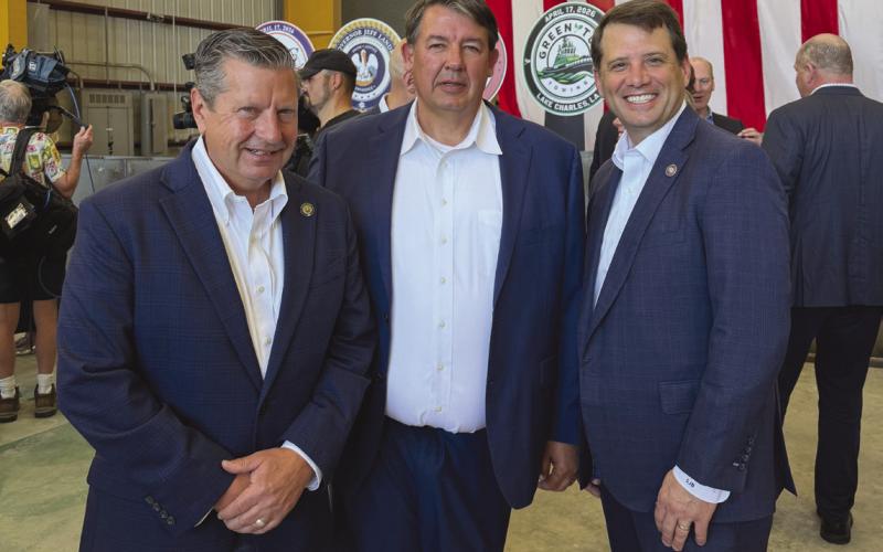 Tony Cibilch at the Keel Laying Ceremony . anked by State Senator Pat Connick, left, and State Representative Jacob Braud.
