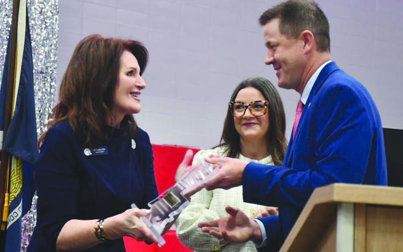 Plaquemines Parish Superintendent Dr. Shelley M. Ritz (left) accepts Models of Excellence award from State Superintendent Dr. Cade Brumley (left) during a ceremony held at Belle Chasse Middle. Photos taken by Ted Beasley