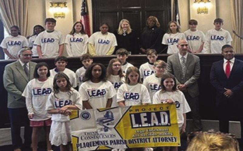 Our Lady of Perpetual Help students with Charles J. Ballay, District Attorney, Avery Riley, Assistant District Attorney, Daniel Swear, Assistant District Attorney, Judge Lobrano and Brenda Hymes.
