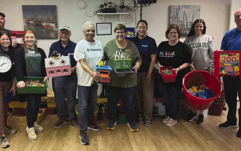 One of the Kiwanis service projects involved members helping clean and tidy the Plaquemines Community C.A.R.E. Center.