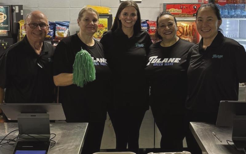 Members worked Tulane's concession stand multiple time to help out and fundraise.