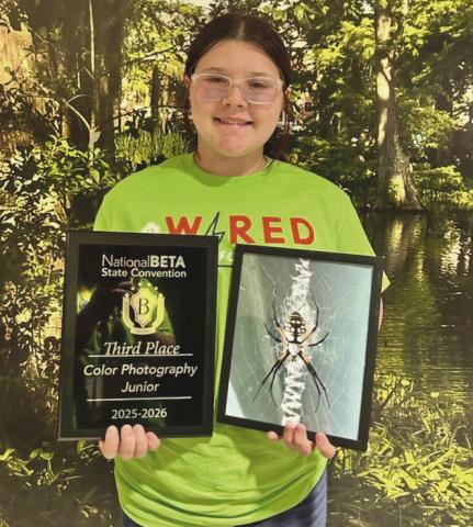 Joleigh Buras placed third in color photography in visual arts junior division.