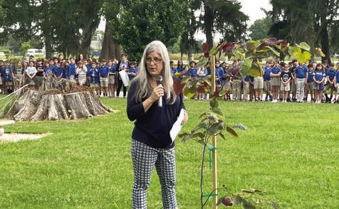 Laura Patron speaks at dedication on May 10.