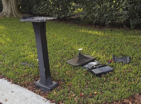 The remaining pieces of Ray Faugeaux's mailbox after the explosion had been set o.