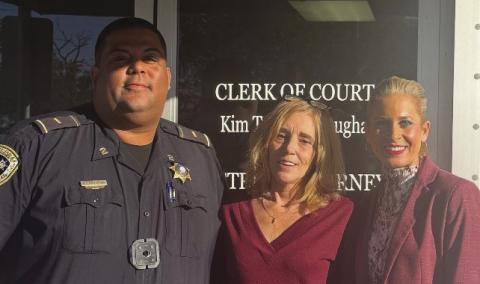 From left: Lt. Rogers Landry Jr., victim Kimberly Daniel and Asst. District Attorney Sarah Ansardi Tesvich