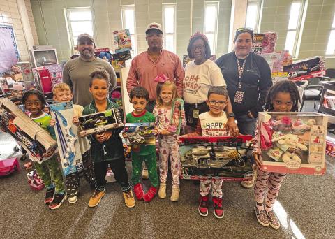 W.T. Byler PLNG Family Donates Toys to Boothville-Venice Students