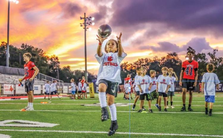 Judge Michael Clement and the Belle Chasse High School Football Team held its annual “Under the Lights” youth football camp on Aug. 12. Over 200 children with ages ranging from 7 to 13 participated in this free of charge event. Due to COVID-19, the camp has not been held the last two years.