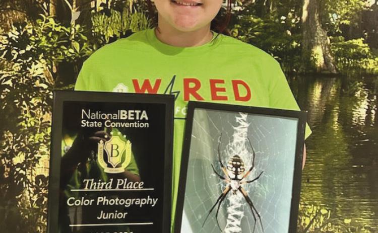 Joleigh Buras placed third in color photography in visual arts junior division.