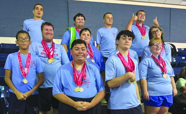 Pelicans representing Plaquemines Parish at the Special Olympics State Swimming Meet.