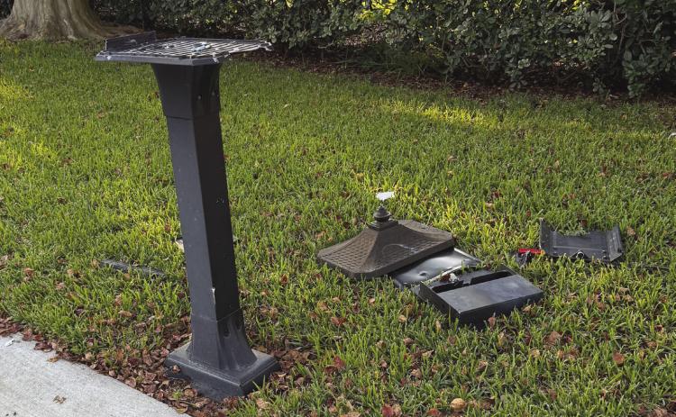 The remaining pieces of Ray Faugeaux's mailbox after the explosion had been set o.