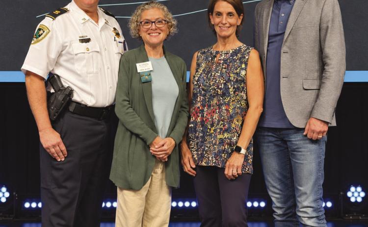 From left: Captain Eric Becnel, Kasey Bealer, Carol Bailey and Pastor Danny Dickson.