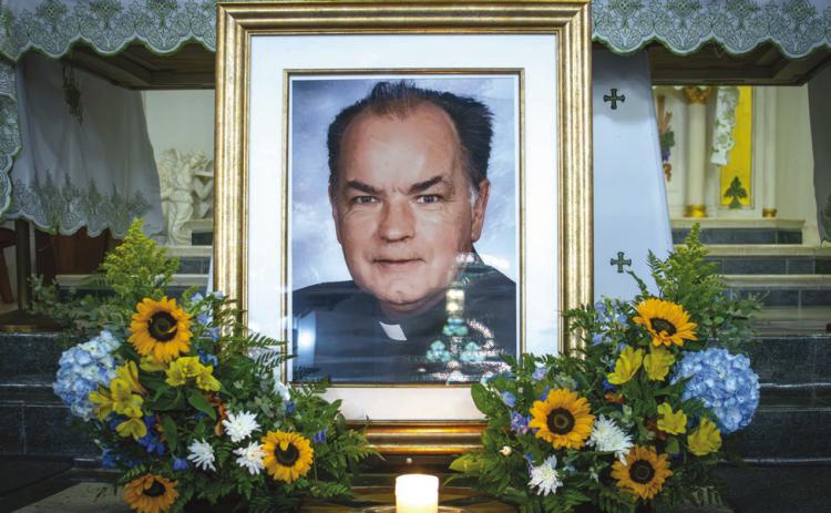 Dozens of friends and community members came to pay their final respects to Father Gerry Stapleton during his memorial on Oct. 27th at St. Patrick's Catholic Church. Photo taken by Tracy Newby