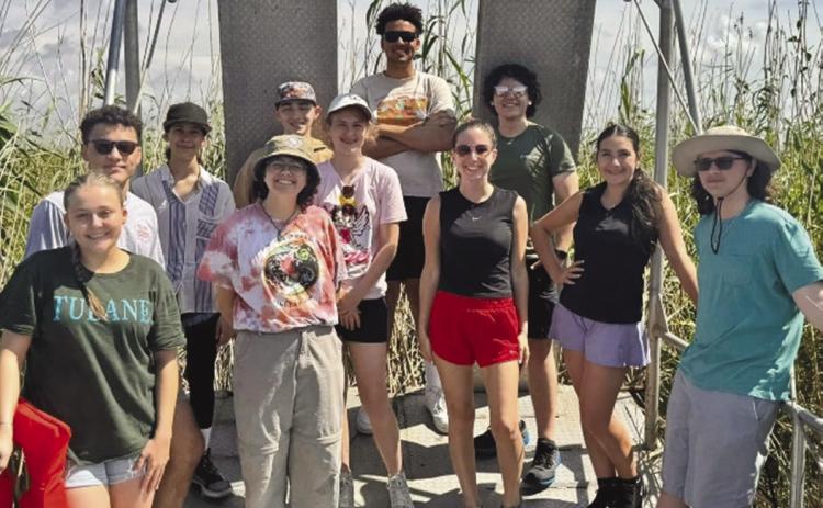 Campers at the mouth of the Mississippi measuring water quality and Rosea Cane. Pictured left to right: Tatiana Cabrera, Norman Morales, Sara Wingrove, Plaquemines Parish 4-H Agent Lou Duplantier, Joseph Suberville, Kelsey Hambrice, Kristion Thomas, St. Bernard Parish 4-H Agent Gabrielle Guerra, Christian Miller, Kathryn Dinet, and Grin Touchet.