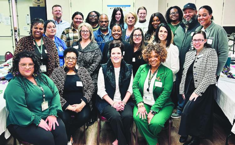 Various medical sta and community members came together to partake in an action planning workshop to strengthen the local health system.