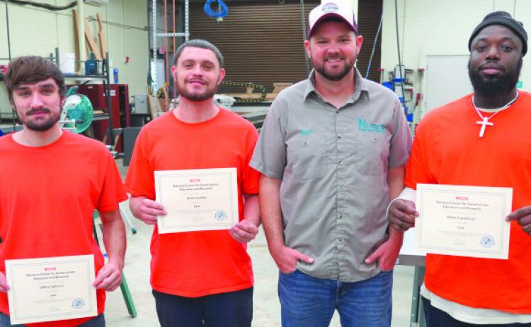 Nunez Community College recently began oering industry-based certificate training to inmates in the St. Bernard Parish and Plaquemines Parish Jails on a regular basis after oering sporadic programs in the past. Pictured, trusties from the St. Bernard Parish Jail, with Nunez Instrumentation instructor Alex Mulvaney, received their NCCER Core basic construction certificates back in November 2023.