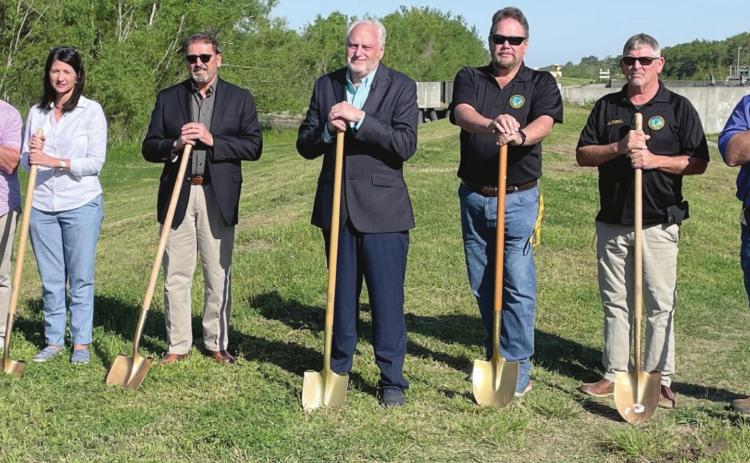 Pictured, from left: Carl Panebiango of Hard Rock Construction poses with district 6 council member Trudy Newberry, district 5 council member Benny Rousselle, parish president Kirk Lepine, coastal director John Helmers, director of operations Scott Rousselle, and public service director Todd Eppley after breaking ground on the Jesuit Bend Levee Lift project.