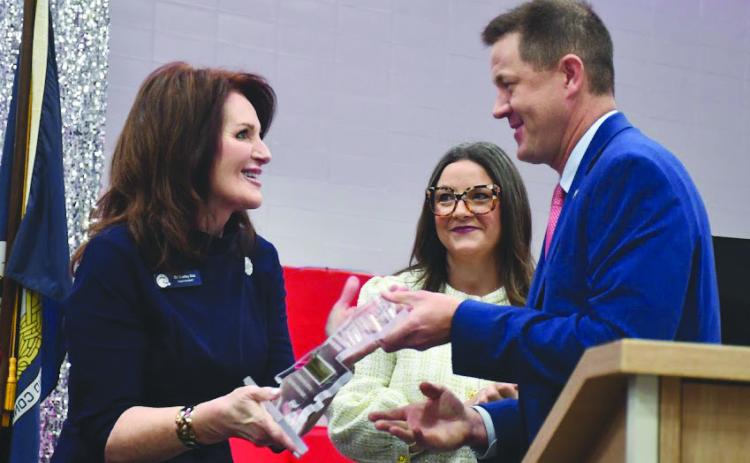 Plaquemines Parish Superintendent Dr. Shelley M. Ritz (left) accepts Models of Excellence award from State Superintendent Dr. Cade Brumley (left) during a ceremony held at Belle Chasse Middle. Photos taken by Ted Beasley