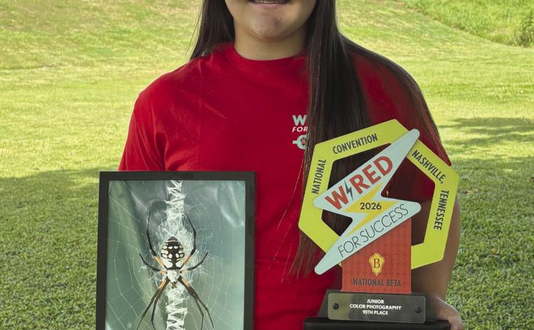 Joleigh Buras placed 10th in the junior division visual color photography category at the National Junior Beta Convention with her photo 'Banana Spider on Web'.