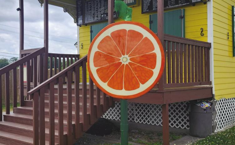 'A Slice of Plaquemines', is currently installed at Papa Joe's Snowballs in Belle Chasse. The almost 8-foot sculpture was created under the direction of Jo Hughes and lead project manager Paige Britton.